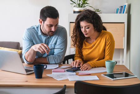 couple doing finances at home